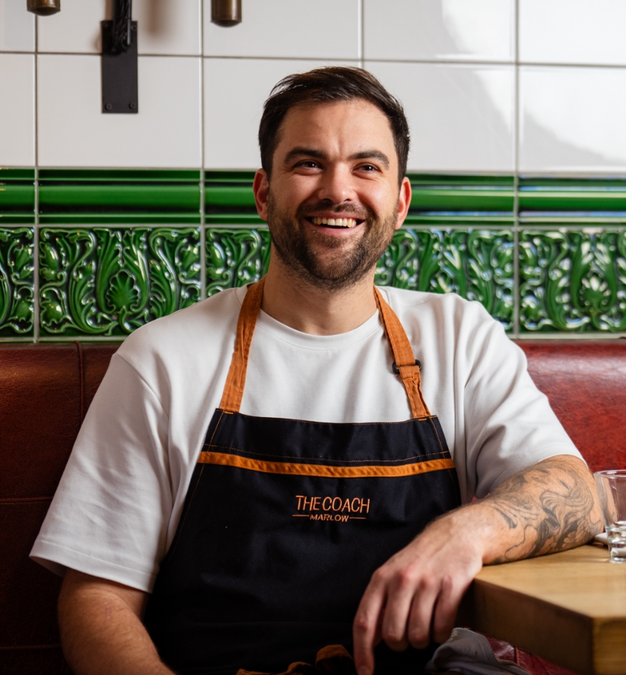 Head Chef Brad Cacela smiling